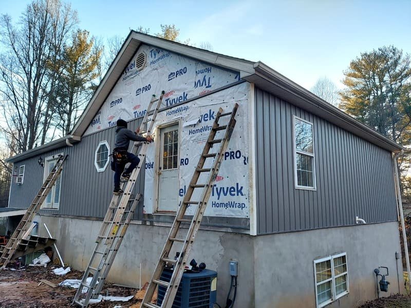 Before siding installation on residential home in North Carolina by Green Mountain Constructions